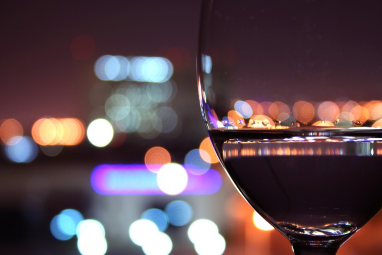 wine glass with blurred lights
